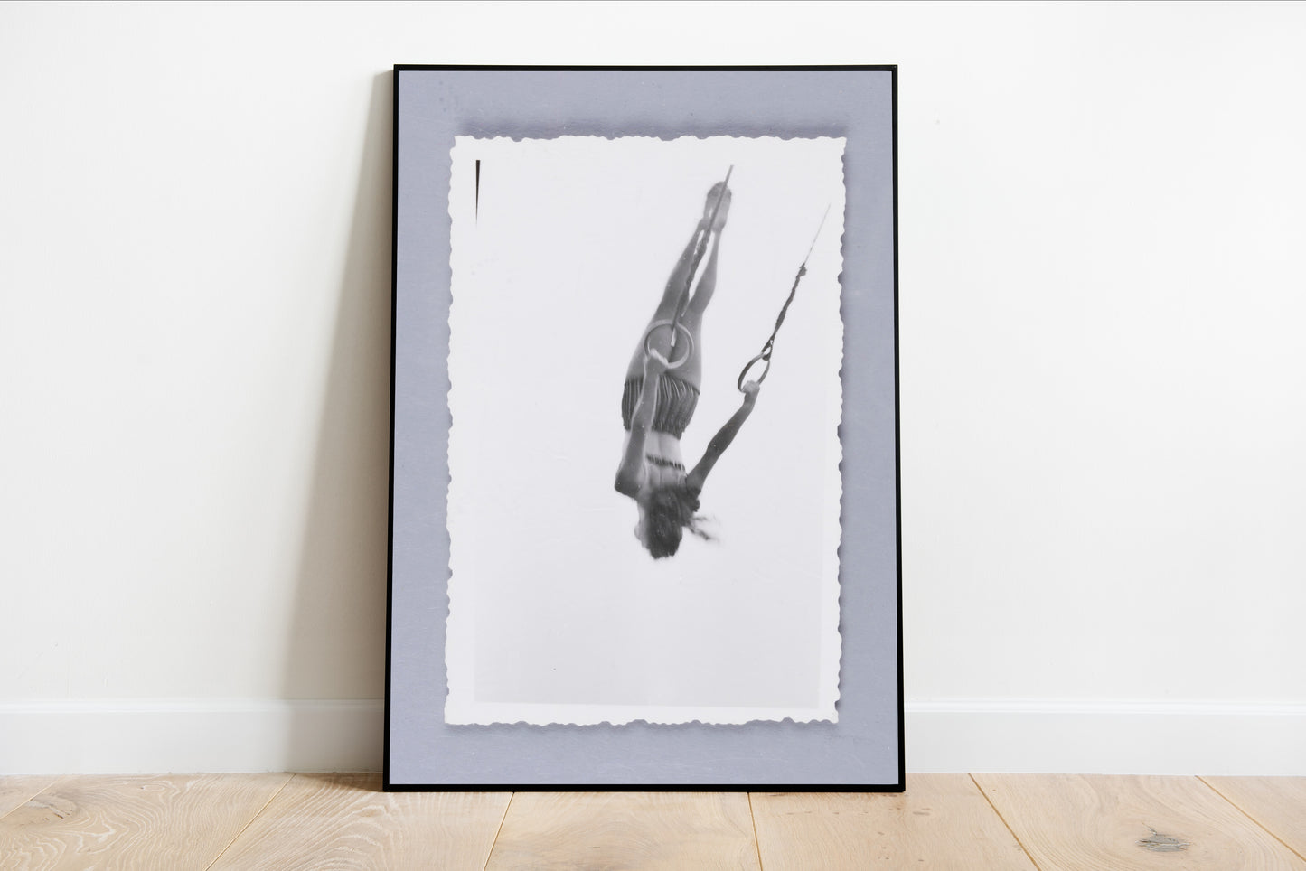 Woman Swinging on Rings