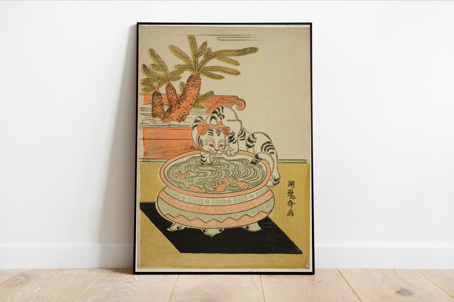 Cat Pawing at Goldfish