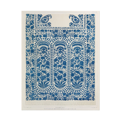 Intricate blue floral embroidery design on white muslin