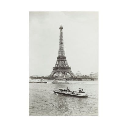 Black and white print of the Eiffel Tower beside the Seine River.