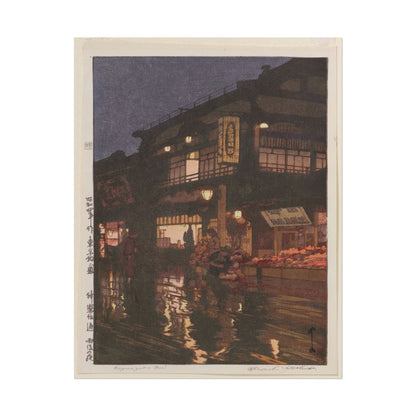 Twilight scene of Kagurazaka Street with lanterns and reflections.