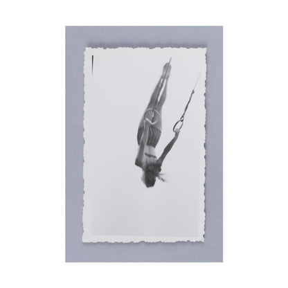 Woman Swinging on Rings