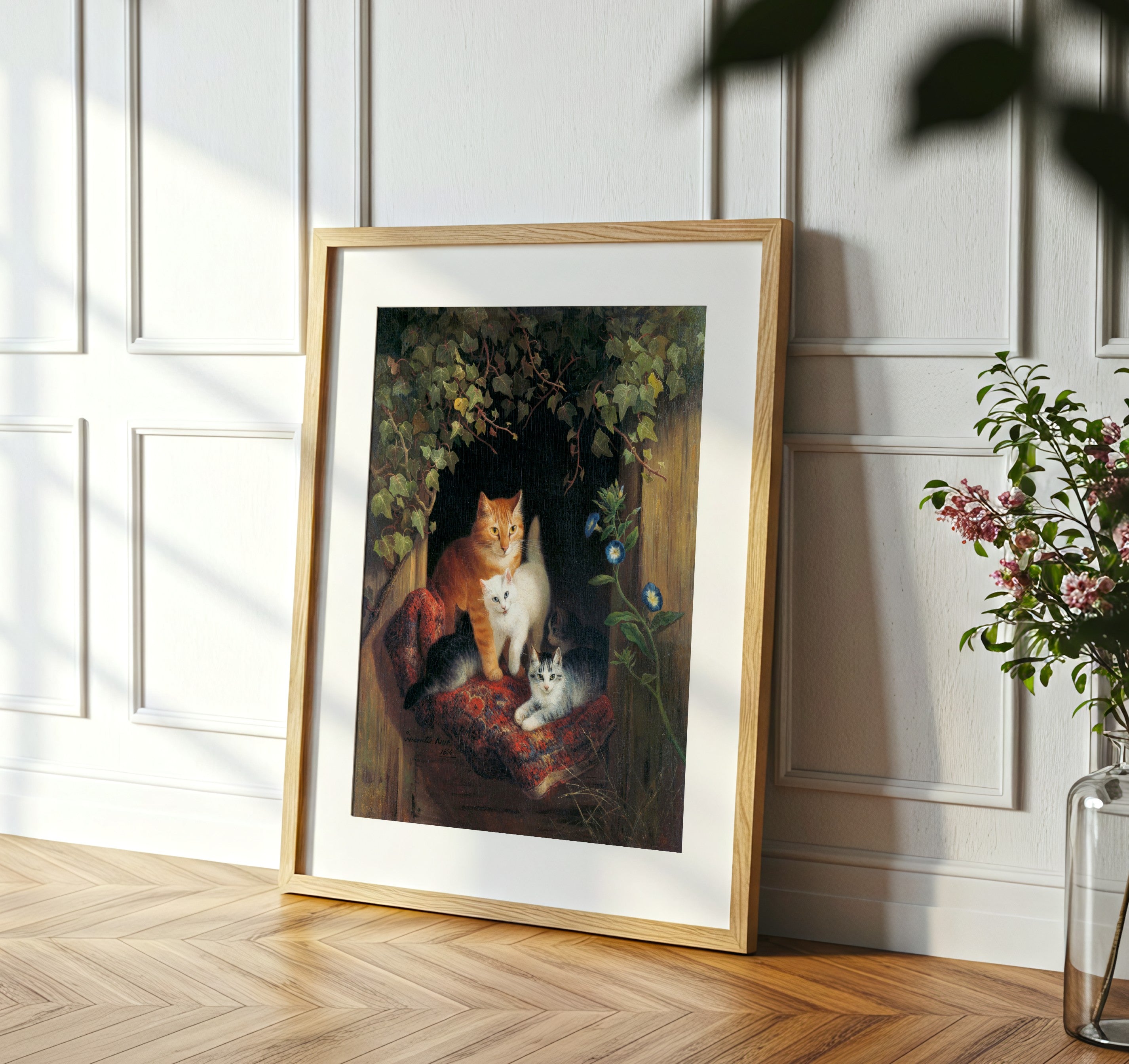 Cat and Kittens painting by Henriette Ronner framed on a wall