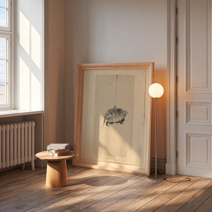 Tortoise Suspended by String