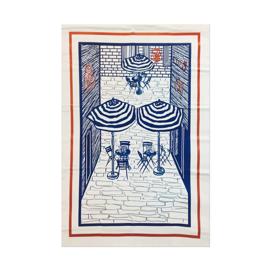 Line drawing of a French café scene with umbrellas and seating.