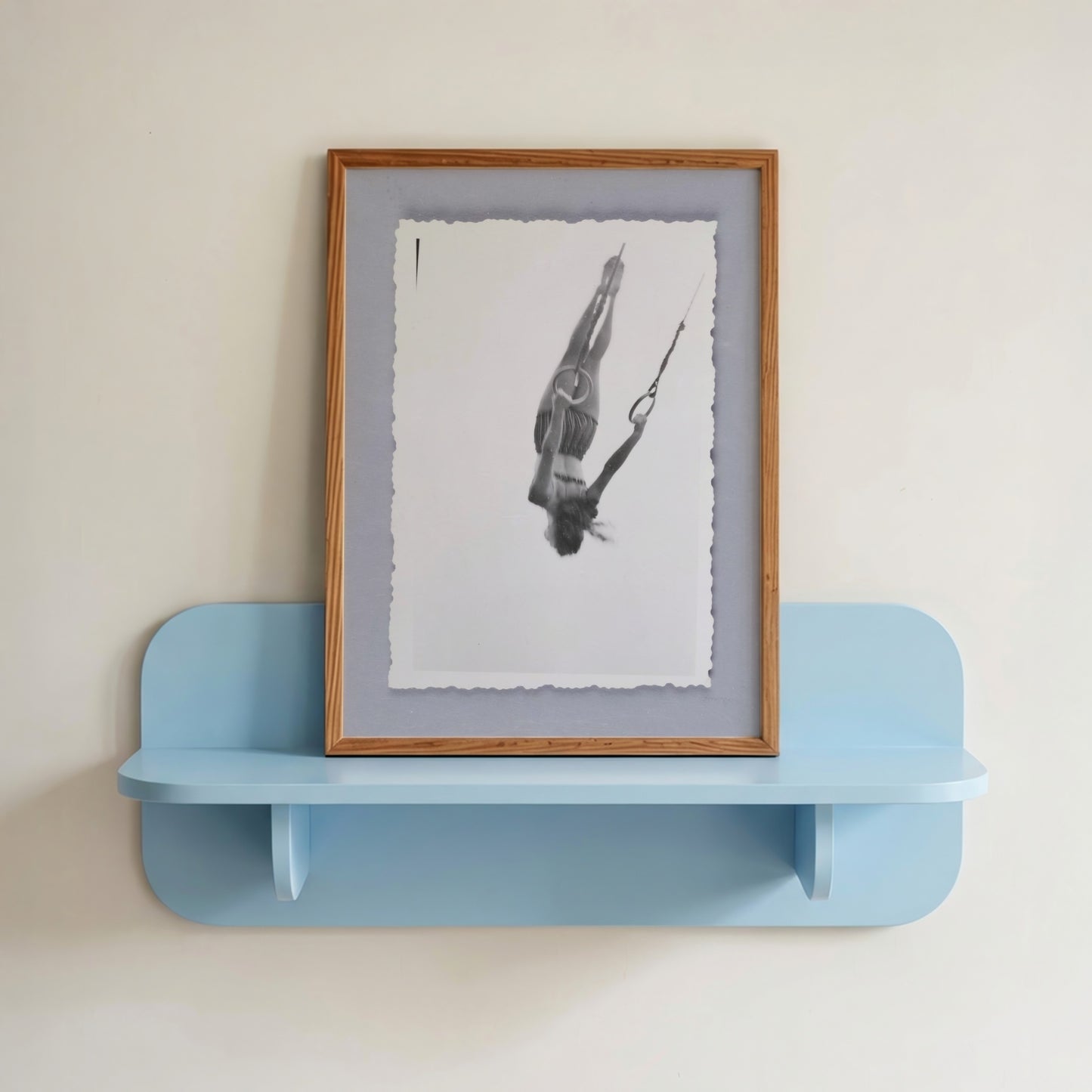 Woman Swinging on Rings