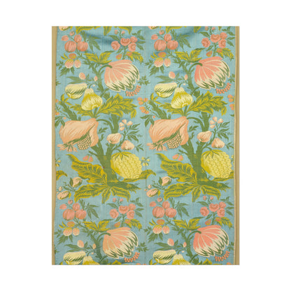 Colorful floral pattern with pink and yellow flowers on blue background.