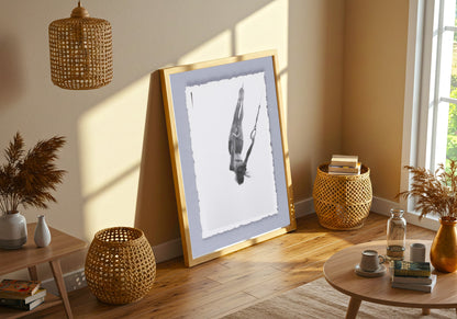 Woman Swinging on Rings