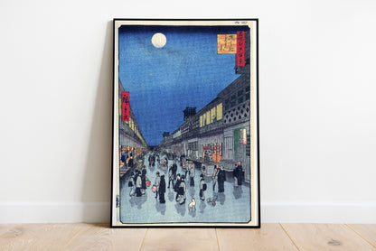 Night view of Saruwaka Machi poster by Utagawa Hiroshige - Black frame wall art