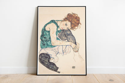 Seated Woman with Bent Knee poster by Egon Schiele - Black frame wall art