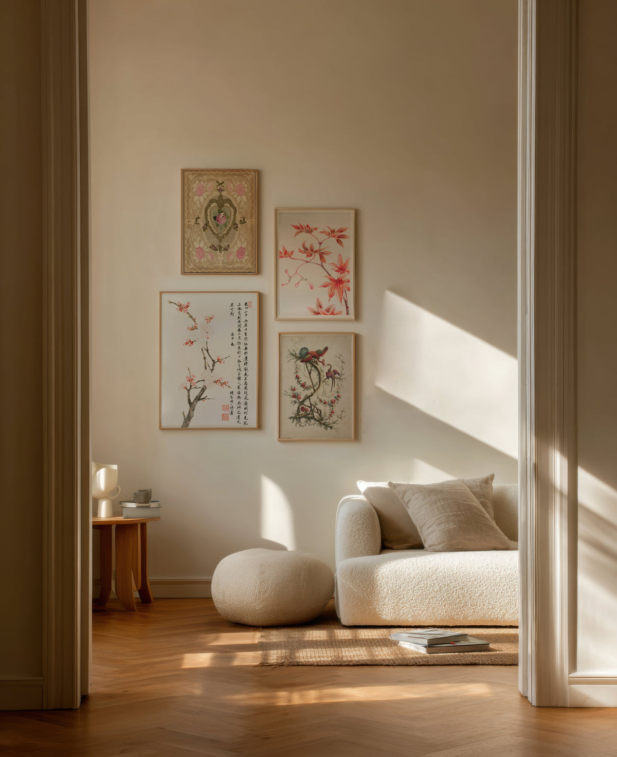 Living room with a beige sofa, ottoman, and wall art